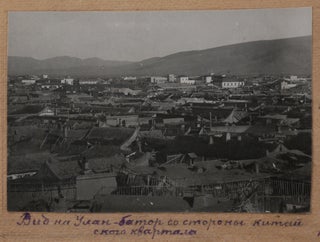 [ASIA - MONGOLIA] [Album with ca. 150 Original Gelatin Silver Snapshot Photographs of Ulaanbaatar during the Early Years of Socialistic Mongolia, Showing the Sükhbaatar Square, the Chinese Quarter, Bogd Khan’s Winter Palace, Buddhist Temples, Zakhadyr Market, Scenes from the Naadam Festival, Mongolian Wrestling, Costumes, Hairdos, Yurts and Houses, etc.]