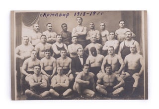 Item #1768 [WRESTLING IN ITS EARLY PERIOD IN RUSSIA] Post card with a group photograph of...