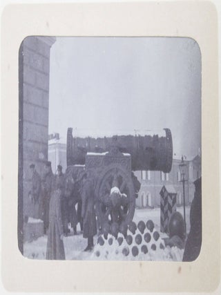 [RUSSIA - MOSCOW] [Album with Fifty Original Gelatin Silver Photographs of Pre-Revolutionary Tsarist Moscow, Showing the Now-Destroyed Sukharev Tower and Alexander II Monument, Tsar Bell & Canon, Saint Basil's Cathedral, Morozov Mansion, St. Clement&rsquo;s Church, Kremlin Tower, etc.; Individual and Group Portraits of Monk Beggars, Grenadiers, Cossacks, Police Officers, and Troika Drivers, and Scenes from Easter Bazaar, Parade, etc.; also, with the Photos of the Trinity Lavra of St. Sergius in Sergiyev Posad and the Now-Destroyed Gethsemane Chernigov Skete]