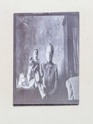 [RUSSIA - MOSCOW] [Album with Fifty Original Gelatin Silver Photographs of Pre-Revolutionary Tsarist Moscow, Showing the Now-Destroyed Sukharev Tower and Alexander II Monument, Tsar Bell & Canon, Saint Basil's Cathedral, Morozov Mansion, St. Clement&rsquo;s Church, Kremlin Tower, etc.; Individual and Group Portraits of Monk Beggars, Grenadiers, Cossacks, Police Officers, and Troika Drivers, and Scenes from Easter Bazaar, Parade, etc.; also, with the Photos of the Trinity Lavra of St. Sergius in Sergiyev Posad and the Now-Destroyed Gethsemane Chernigov Skete]