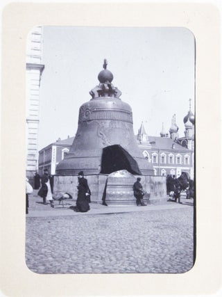[RUSSIA - MOSCOW] [Album with Fifty Original Gelatin Silver Photographs of Pre-Revolutionary Tsarist Moscow, Showing the Now-Destroyed Sukharev Tower and Alexander II Monument, Tsar Bell & Canon, Saint Basil's Cathedral, Morozov Mansion, St. Clement&rsquo;s Church, Kremlin Tower, etc.; Individual and Group Portraits of Monk Beggars, Grenadiers, Cossacks, Police Officers, and Troika Drivers, and Scenes from Easter Bazaar, Parade, etc.; also, with the Photos of the Trinity Lavra of St. Sergius in Sergiyev Posad and the Now-Destroyed Gethsemane Chernigov Skete]
